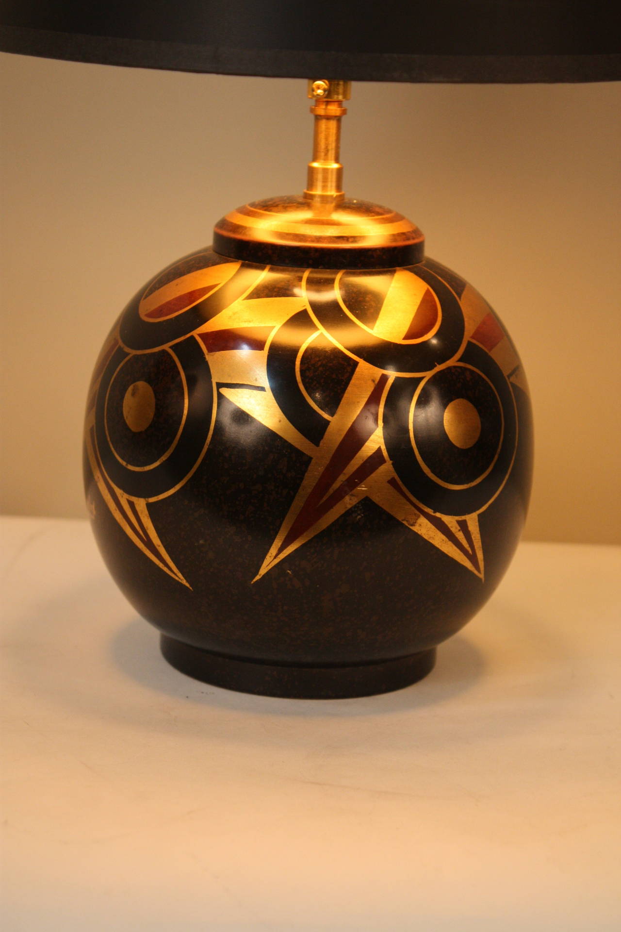Beautiful oxidized black bronze lamp base which in special technique copper and gold has been applied on the bronze.