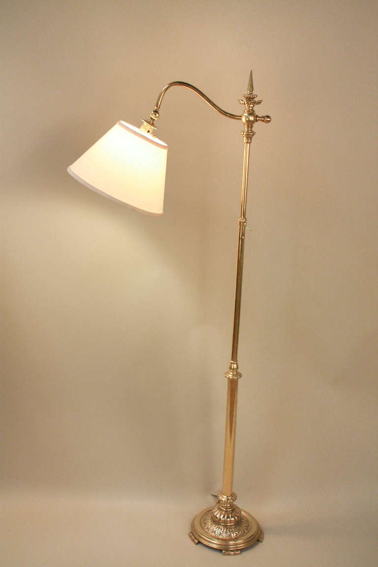 A beautiful bronze adjustable height floor lamp. Elegant, yet simple, this floor lamp is truly timeless piece.