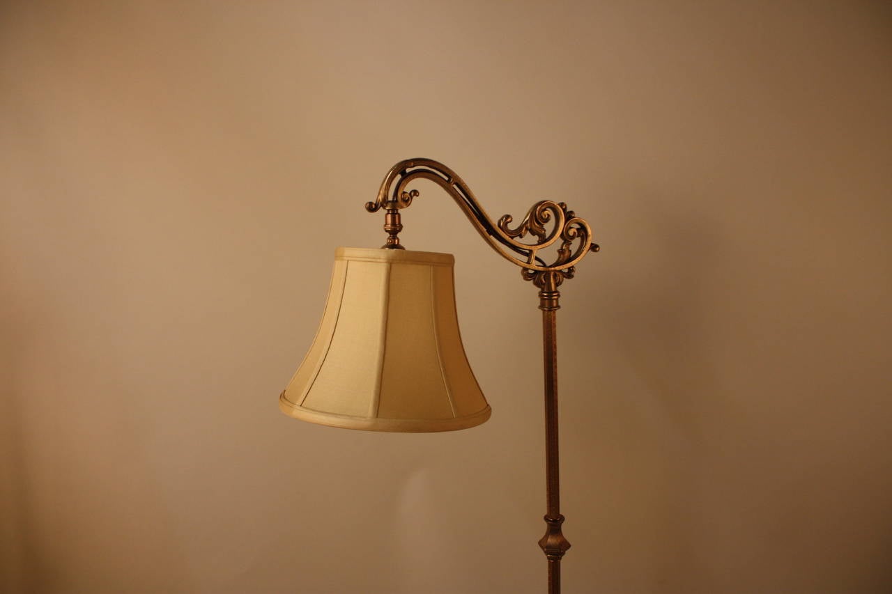 Elegant brass and brass finished bridge floor lamp by Rembrandt lamp co