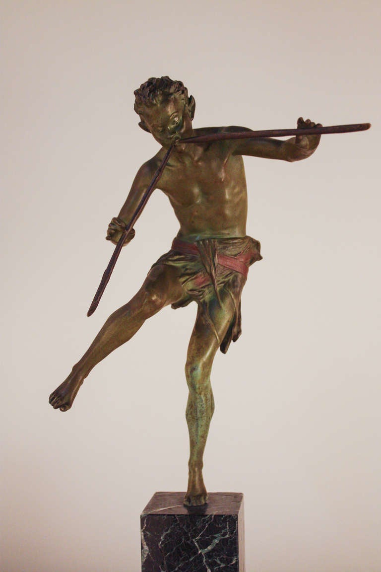 A beautiful bronze sculpture of the mythic Greek god Pan. Masterfully crafted during the 1920's, this gorgeous piece is signed by the artist, Broudt. Made of stunning painted bronze and a dark black marble base, this piece is a true work of art.