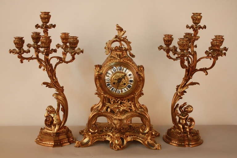FABULOUS 19 CENTURY BRONZE CLOCK SET BY H LUPPENS PARIS . THE CLOCK MOVEMENT BY MEDAL WINNER VINCENTI  & CO.  
CANDELABRAS ARE 11