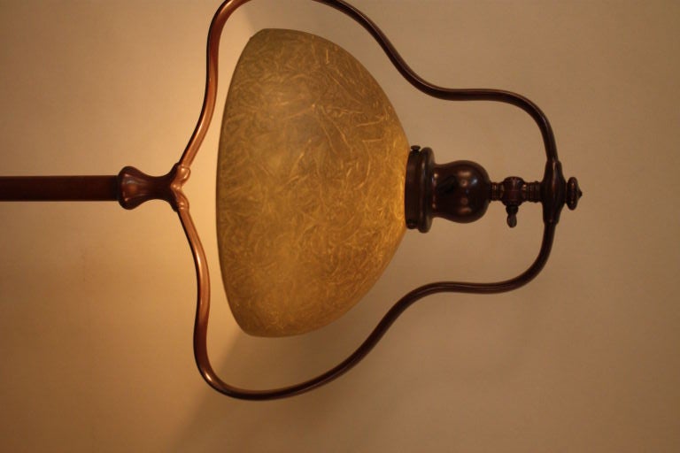 HANDEL FLOOR LAMP WITH THE HARP DESIGN AND NUT BROWN PATINA HAS ORIGINAL SHADE .