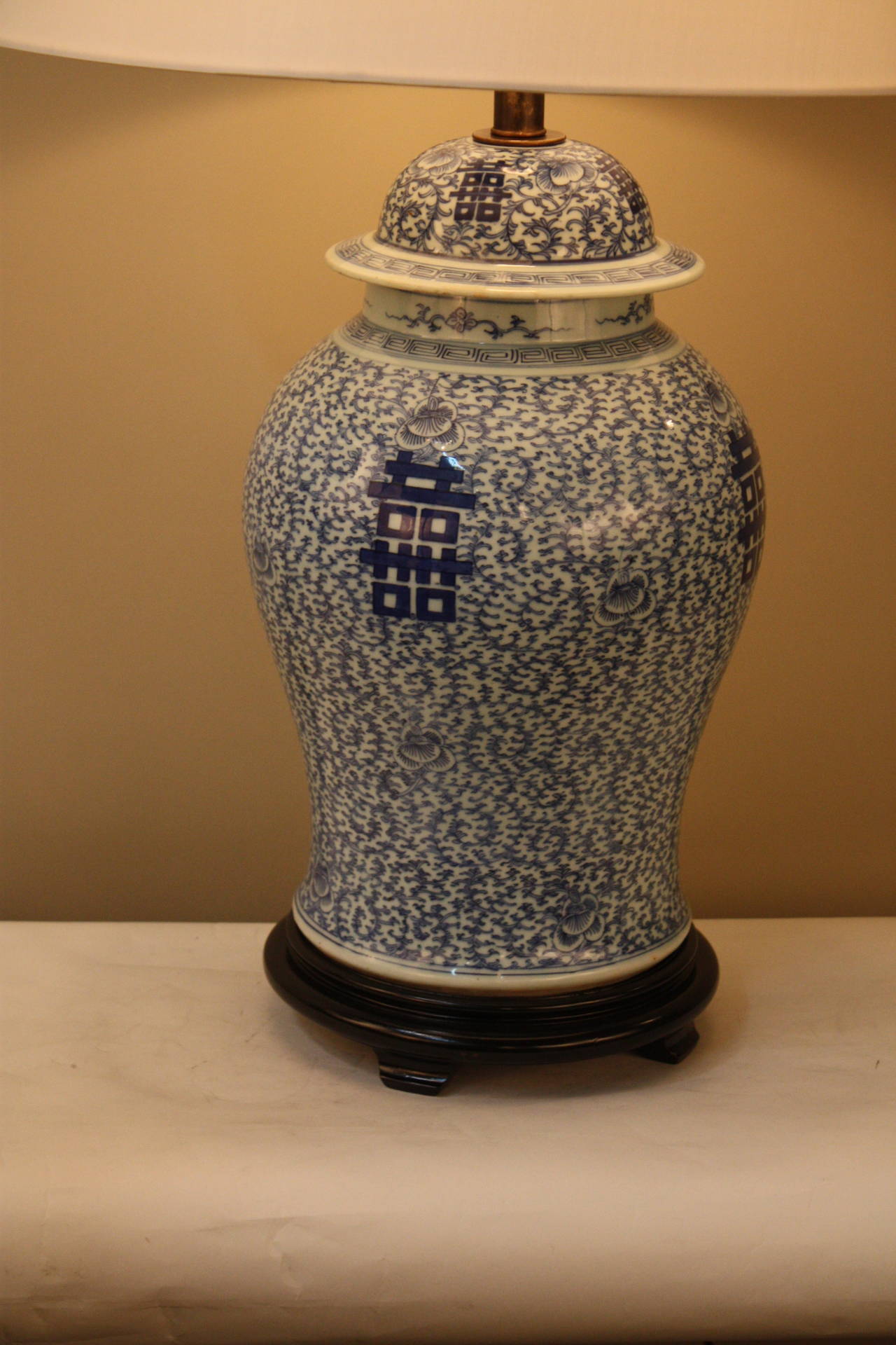 A 19th century Chinese ginger gar porcelain vase in blue decoration and sign of double happiness that has been made to a beautiful table lamp.