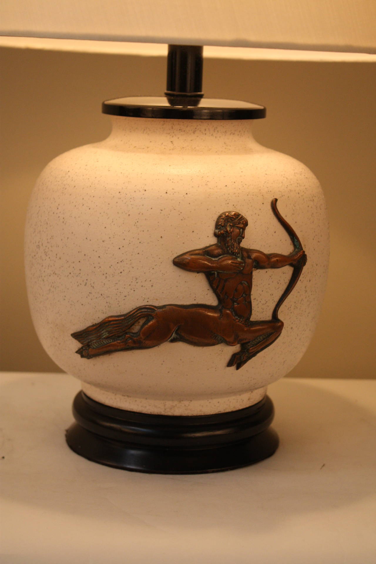 French Mid-Century ceramic lamp with bronze centaur in bedded on the lamp by famous Parisian ceramist Pol Chambost.