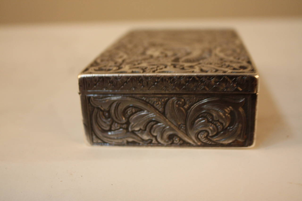 Hand made silver box with dragon which is symbol of power.