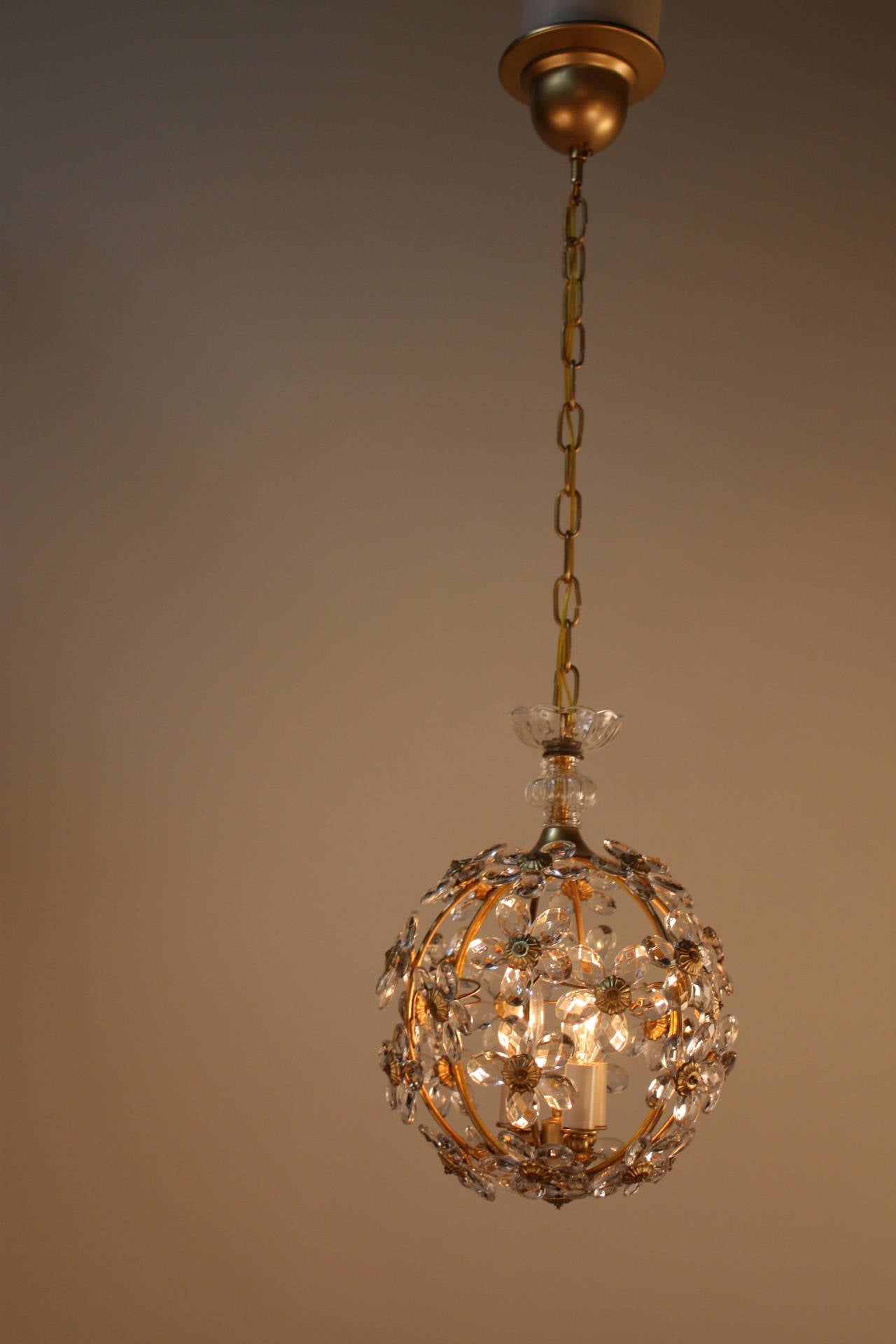 Wonderful three-light crystal chandelier in the style of Maison Baguès.
