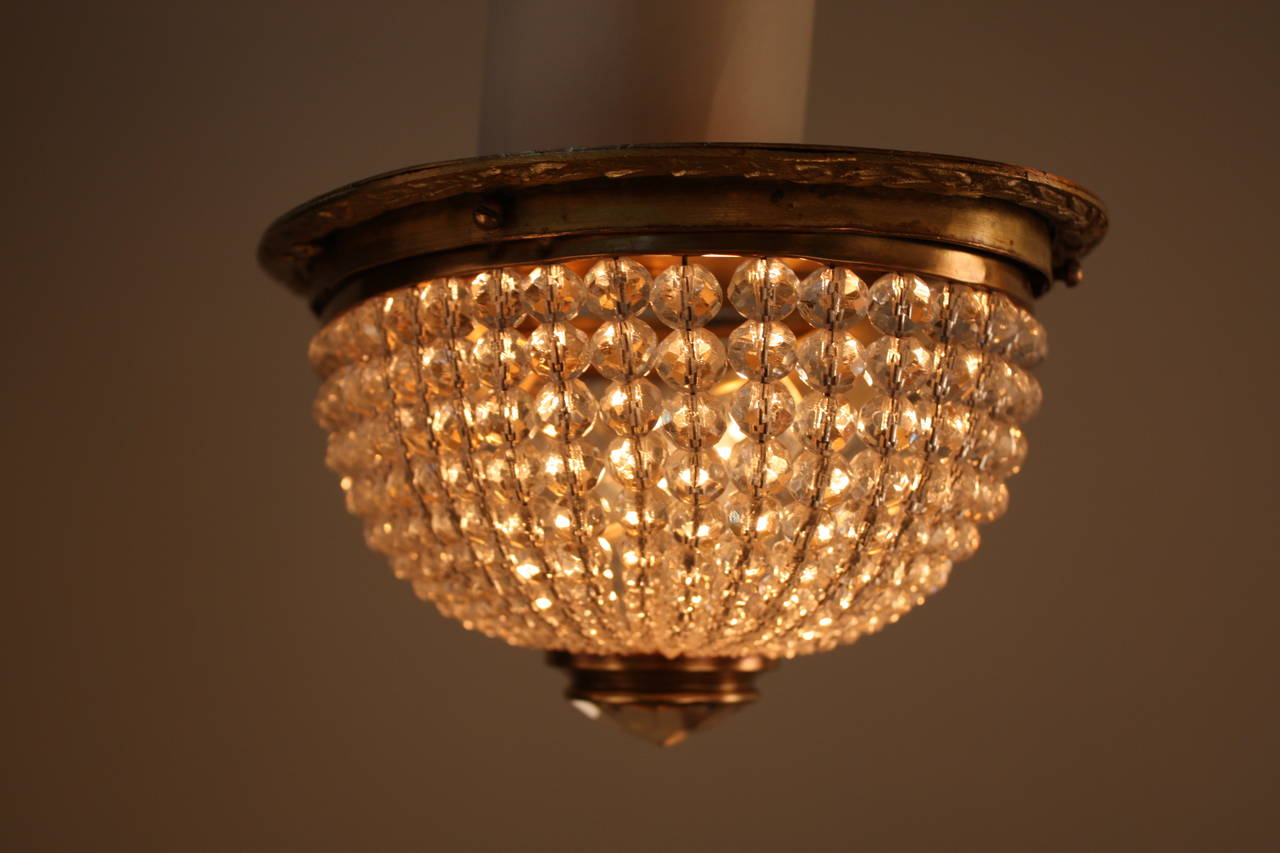 Very elegant two-light oval shape French flush mount light with hundred of sparkling beaded crystal.