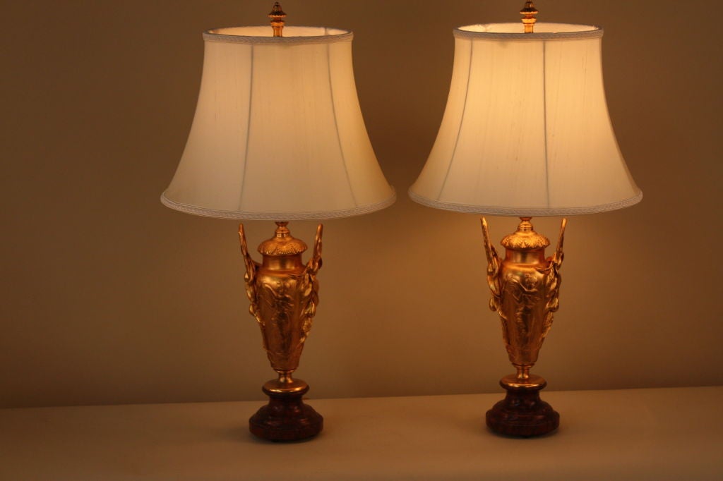 A great pair of bronze doré table lamps. Full of ornate detail and master craftsmanship, these table lamps are as beautiful today as they were over a century ago.