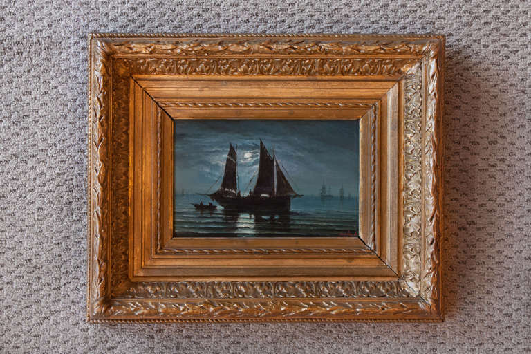 This beautiful oil on wood painting depicts an evening at sea. Sailing on gentle waves under a full moon, the sailors tend to their ship on this calm night. 

This lovely painting is displayed in a wood frame with beautifully carved detail work.