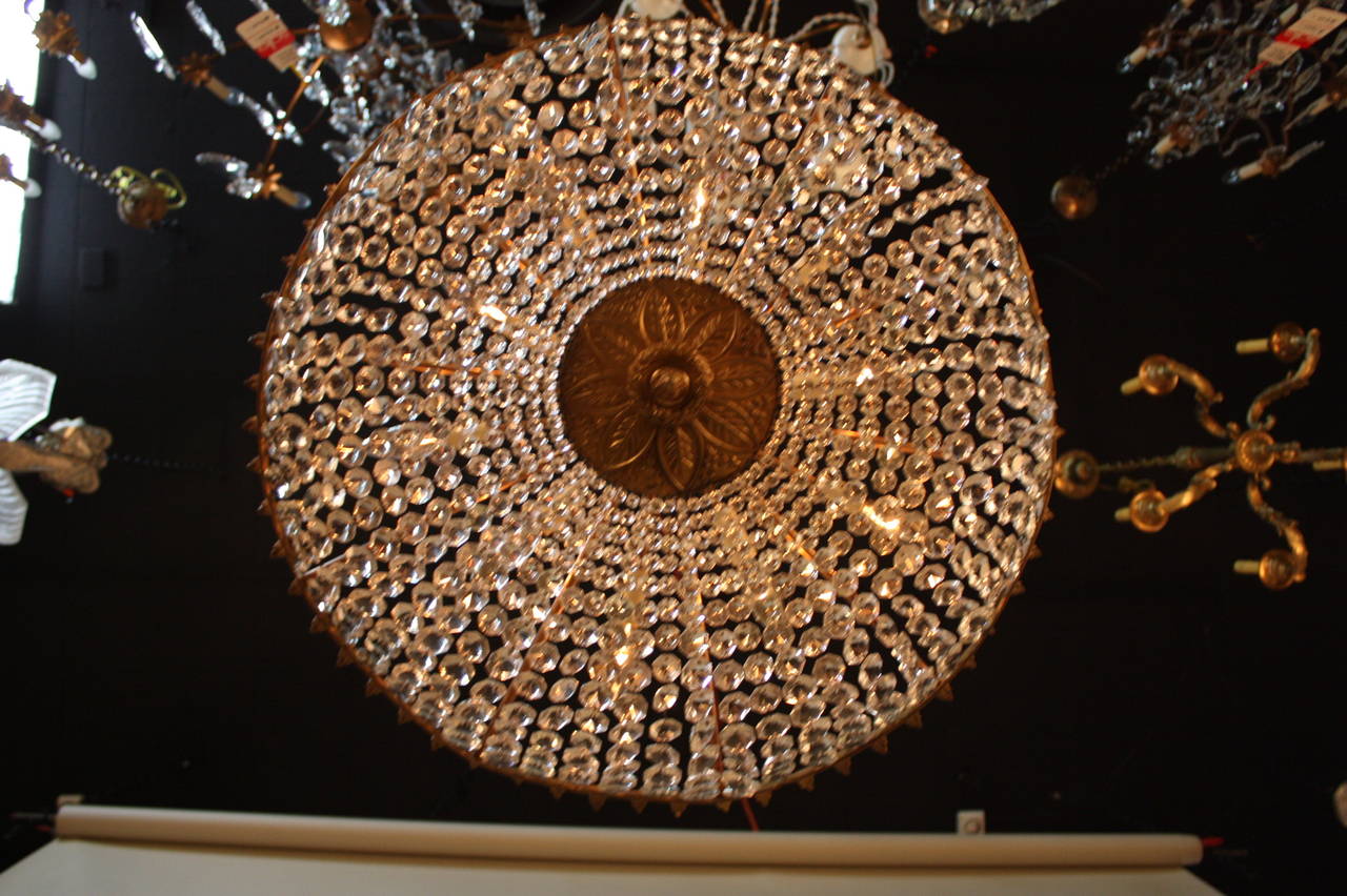 Elegant semi flush mount ten-light Spanish crystal and bronze chandelier.