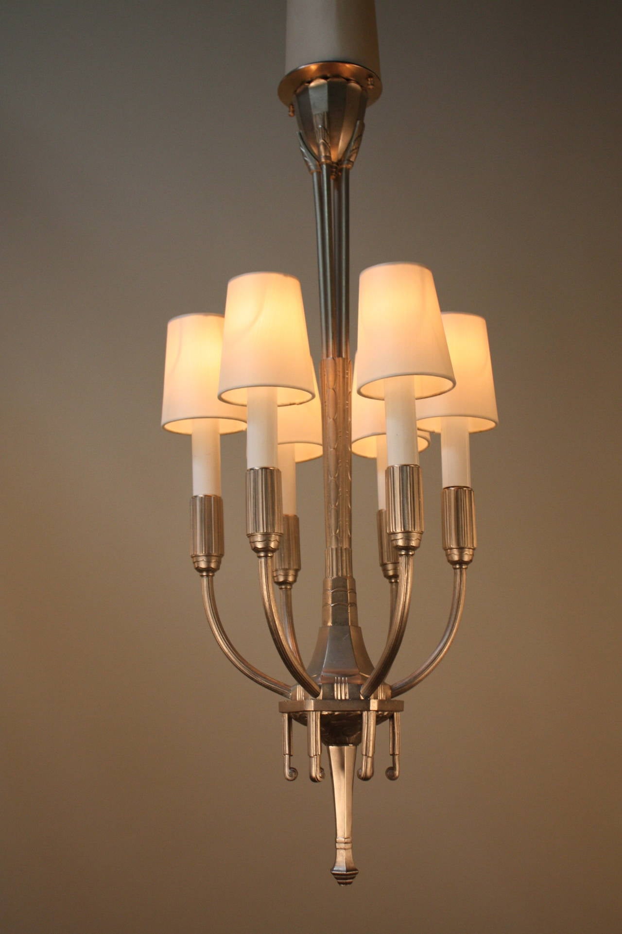 Unusual six-light satin nickel finish on bronze French Art Deco chandelier.