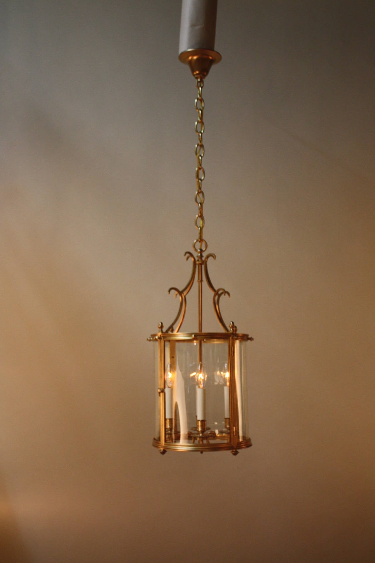 Classic four-light French bronze lantern with one panel as a door.