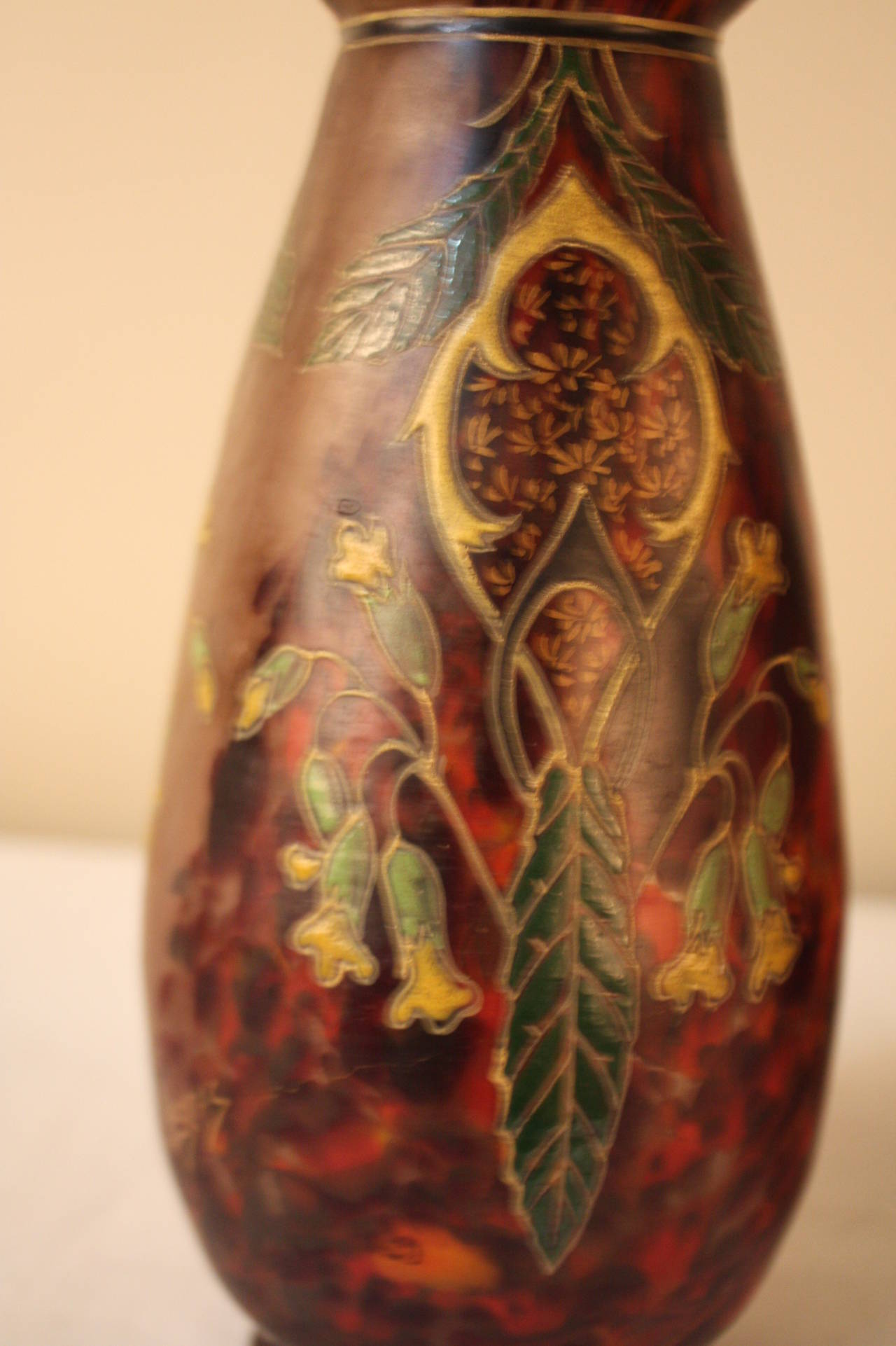 This pair of Legras vases are a wonderful example enamel hand-painted over blown glass.