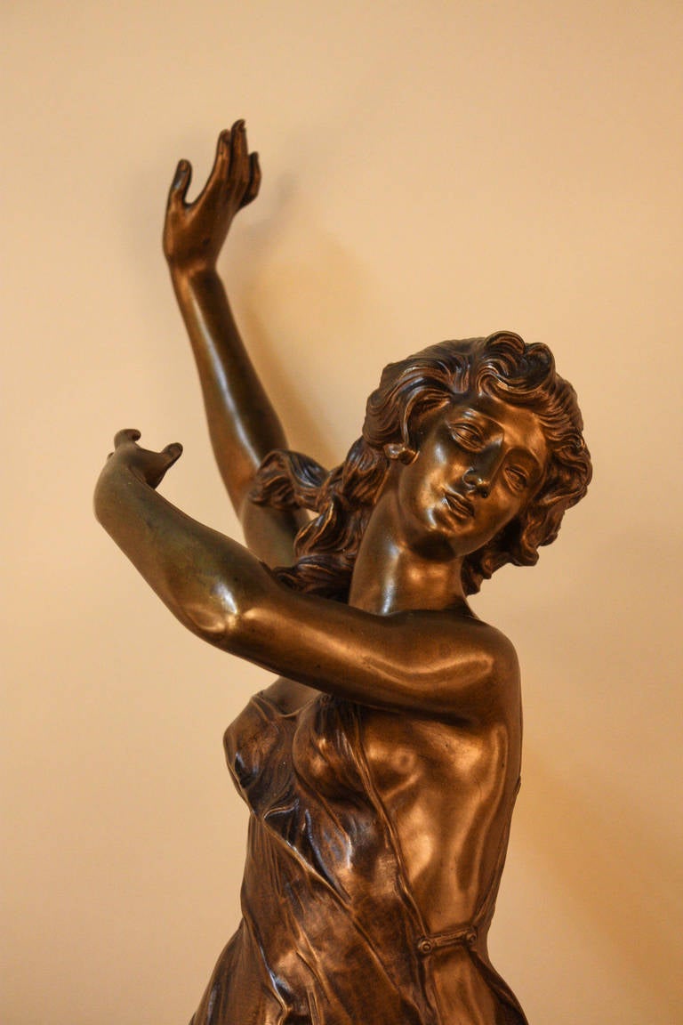 exceptionally beautiful bronze dancer with movement from Art Nouveau period in classic forum. This piece was Paris exposition C 1900. By P Darlefeuille
