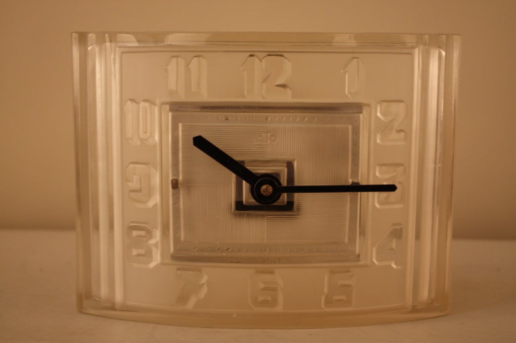 This R. Lalique frost glass clock is made in 1920s for ato clock co which was very advance in clock making