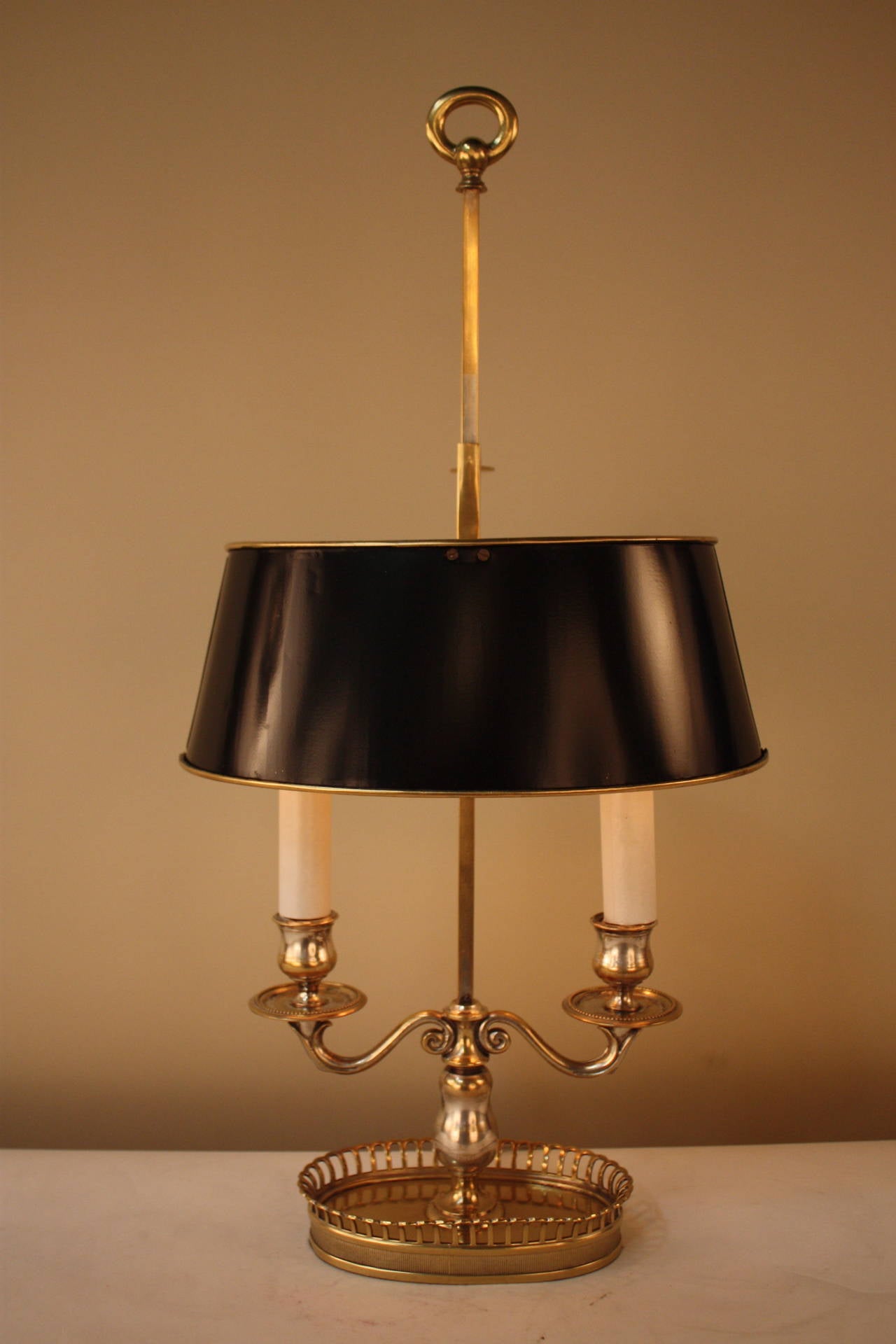 French 1930s double-light Bouillotte lamp which originally was silver plated but has since faded and now is mostly gone which lets the brilliant bronze show that gives a unique look to the lamp.