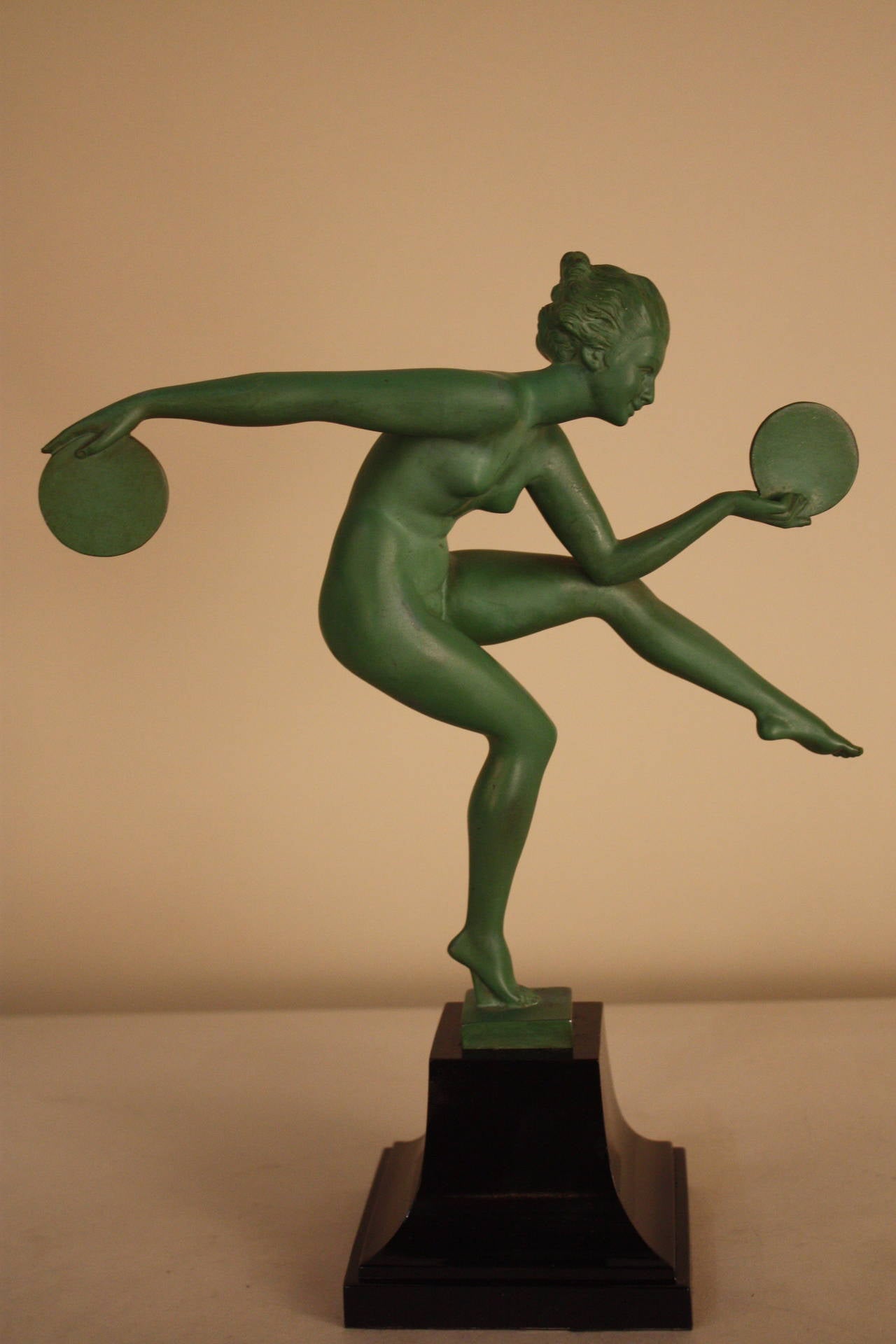 A nice bronze and green patinated spelter Tambourine dancer by Fayral. 
( Le Verrier foundry)