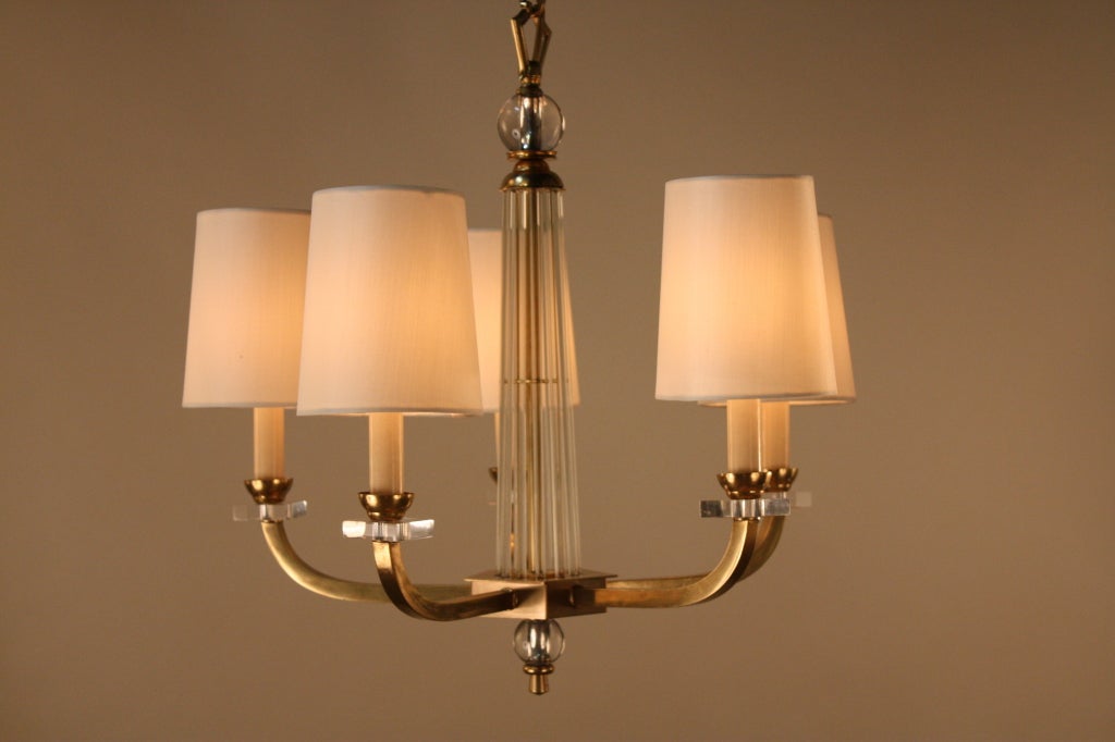 ELEGANT FRENCH MID CENTURY BRONZE CHANDELIER WITH CENTER GLASS RODS AND ACRYLIC BOBECHES.