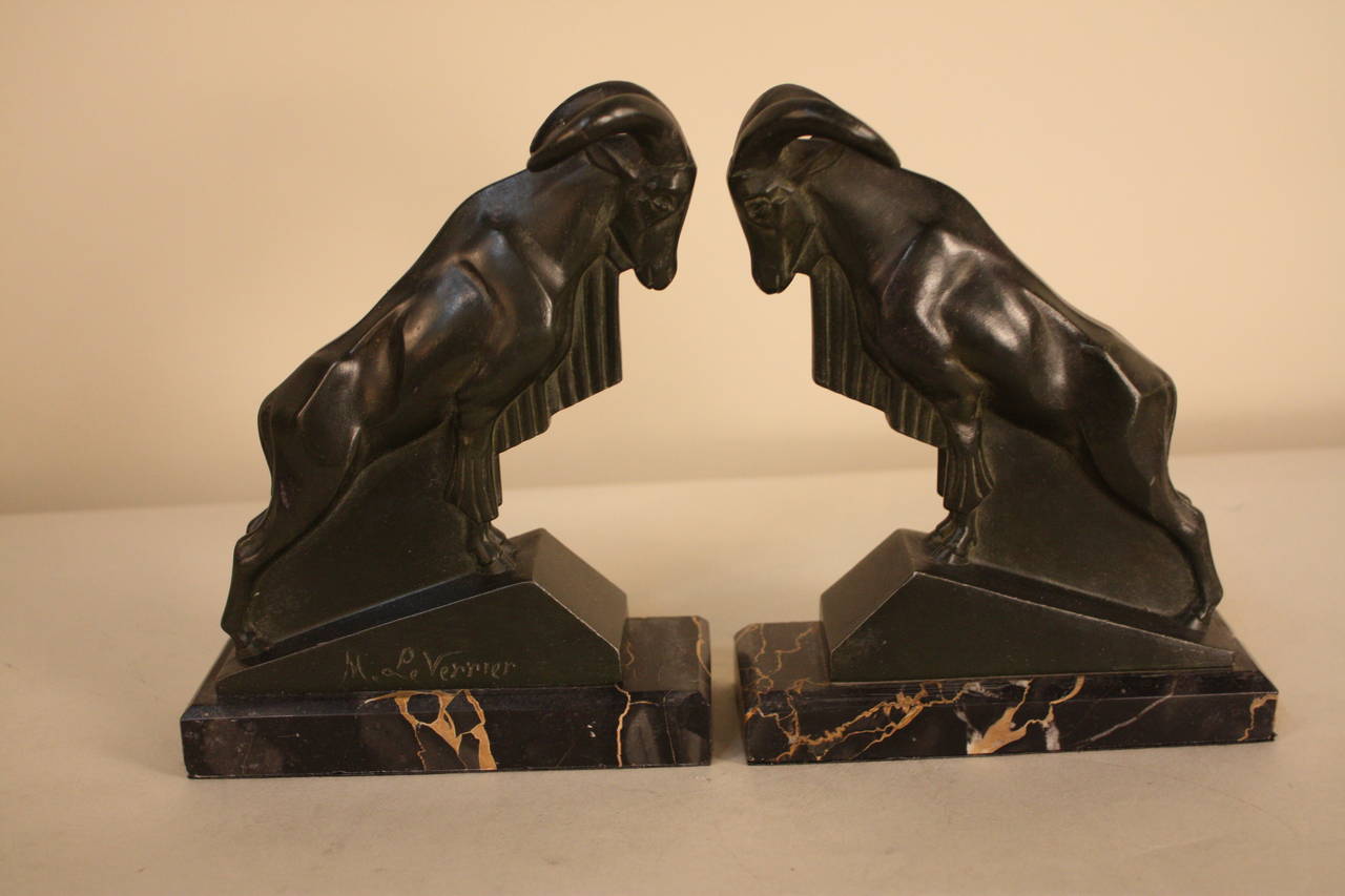 French, very dark green patinated Art Deco bookends by Max Le Verrier.
Each bookend measures: Width 2