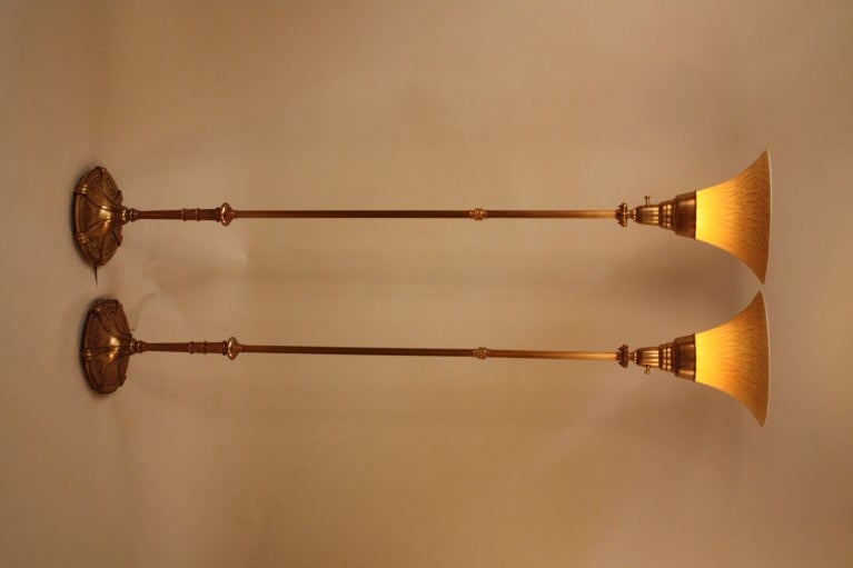 THIS RARE PAIR OF TORCHIERE  ARE DONE BY AMERICAN REMBRANDT LAMP CO AND ARE FINSHED IN SEMI ANTIQUE BRASS .