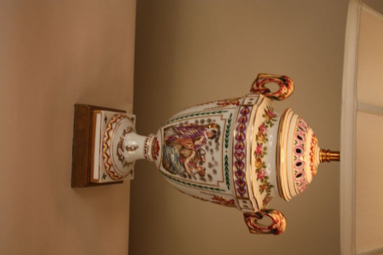 THIS CAPO-DE-MONTE PORCELEAN VASE WAS MADE IN NAPLES ITALY IN 1930S LATER IN LIFE WAS CUSTOMIZED IN TO A LAMP . IT HAS BEAUTIFUL SHAPE AND COLORS .