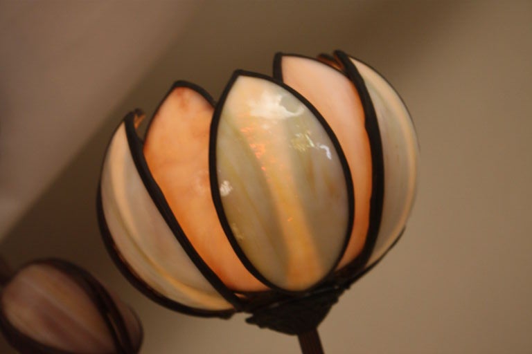 THIS FLORA DESIGN LAMP IS MADE BY AMERICAN WELL KNOWN LAMP CO 