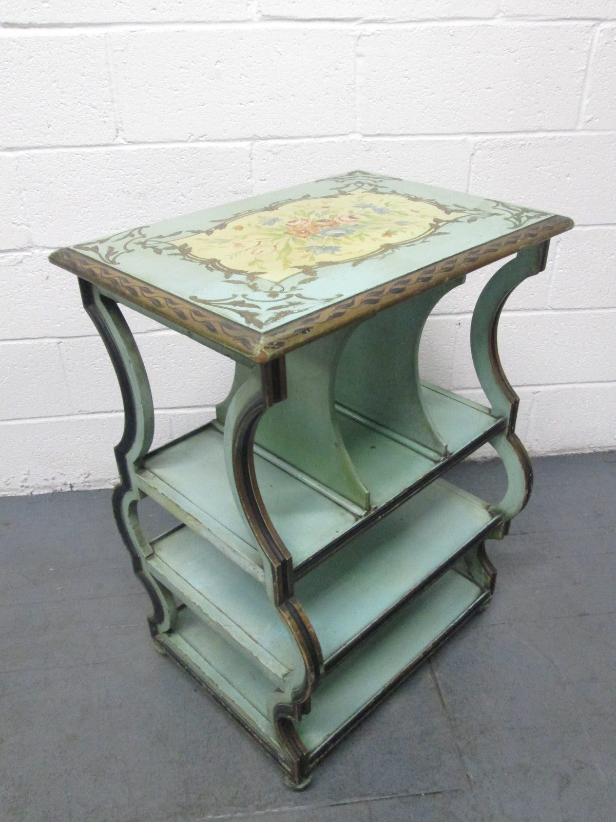 Venetian Hand Painted Magazine Holder / Table.  Has a lovely floral arrangement to the top. Two shelves and three compartments. Venetian Painted