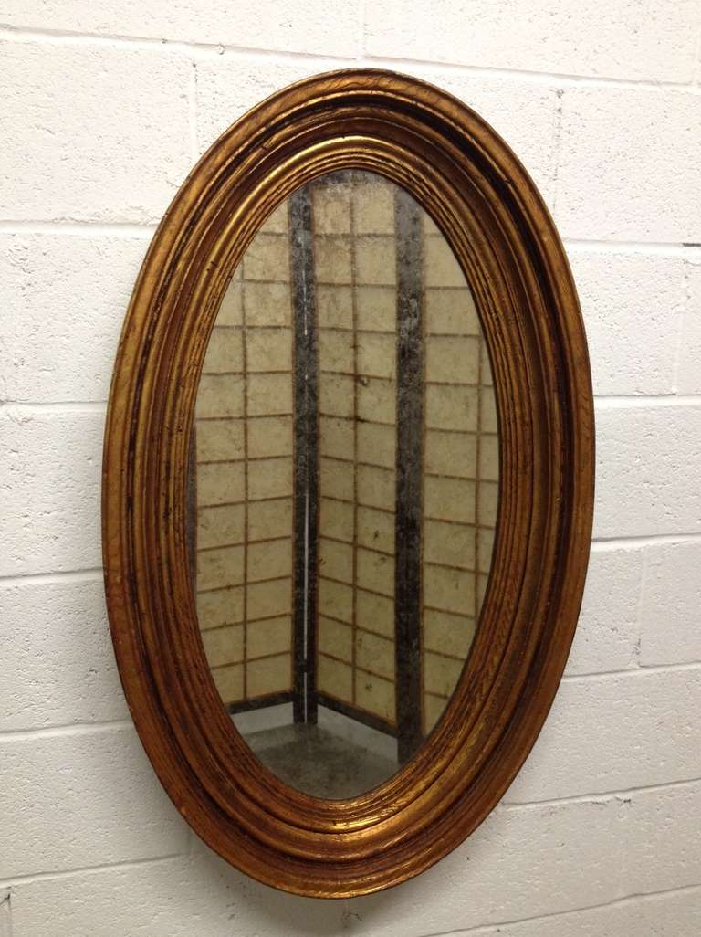 Pair of Gold Gilt Oval Mirrors In Good Condition In New York, NY