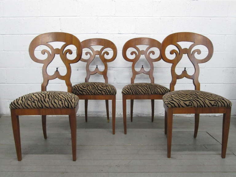 A set of four handsome and nicely proportioned Biedermeier chairs.