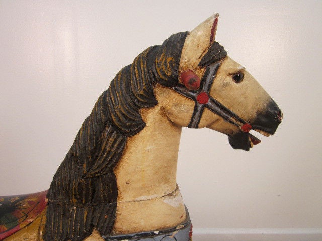 Vintage hand painted carved horse.