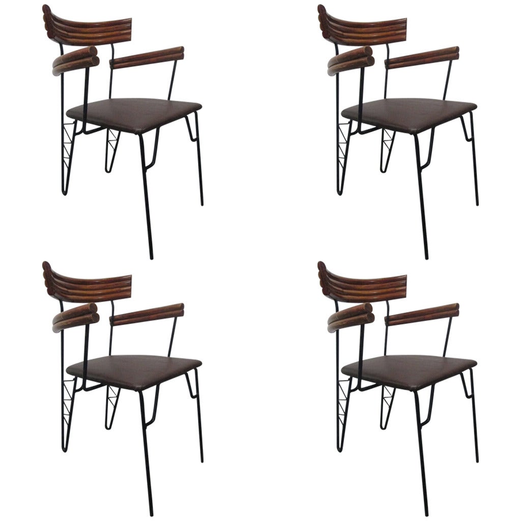 Four 1950s Decorative Wrought Iron and Rattan Chairs