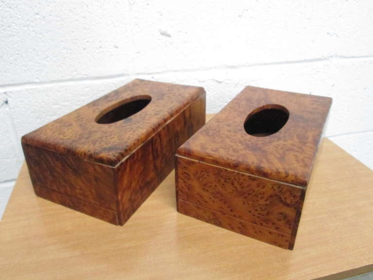 Great looking pair of burl tissue box holders. Nice look for home or office.  Very well made and in good condition for it's age. Base slides off to insert tissue box.