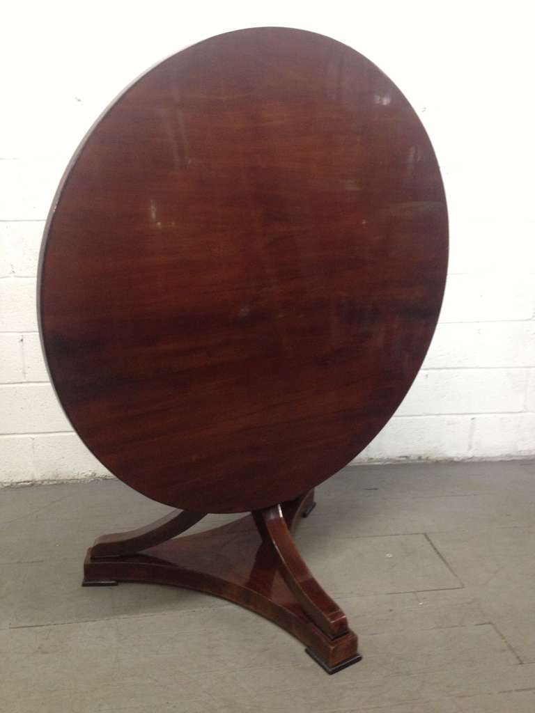 Large round Biedermeier tilt top table.  Table is mahogany and has original hardware.
Measures (in a table position) 49.5