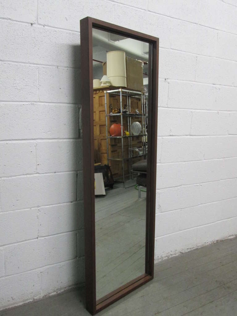 Steel framed mirror which can be used vertically or horizontally.