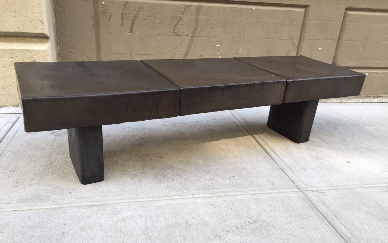 Indoor and outdoor cement glazed ceramic bench.The base is raw steel.  