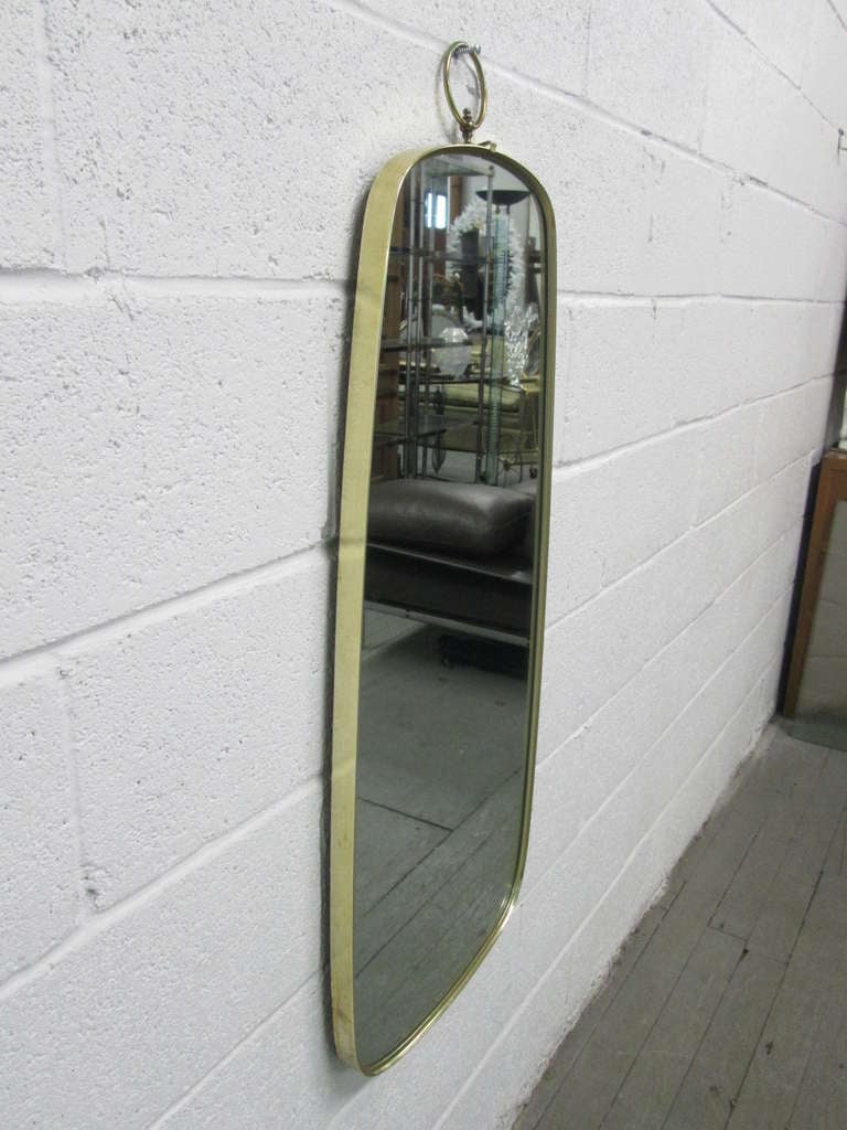 Italian Modernist Brass Mirror with a Decorative Ring at the Top In Good Condition In New York, NY