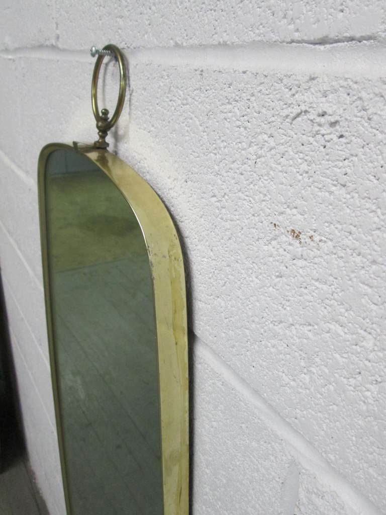 Italian Modernist Brass Mirror with a Decorative Ring at the Top 2