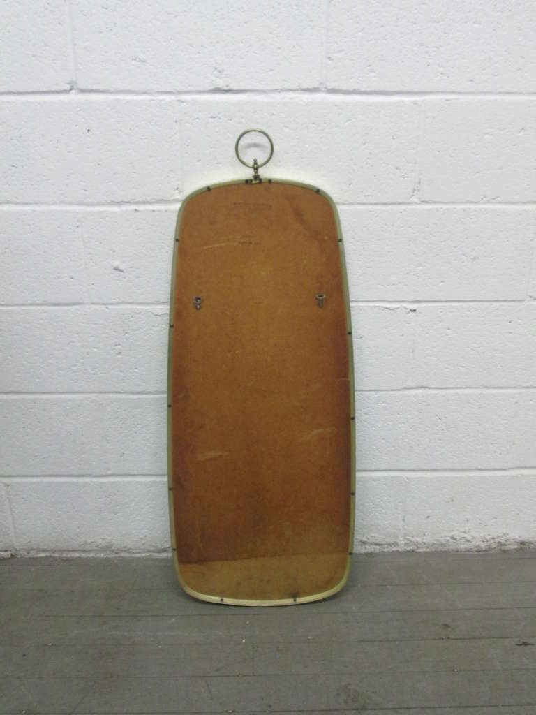 Italian Modernist Brass Mirror with a Decorative Ring at the Top 1
