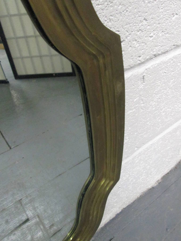 brass scalloped mirror