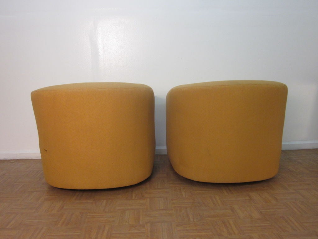 Mid-20th Century Pair of Upholstered Barrel Back Swivel Chairs