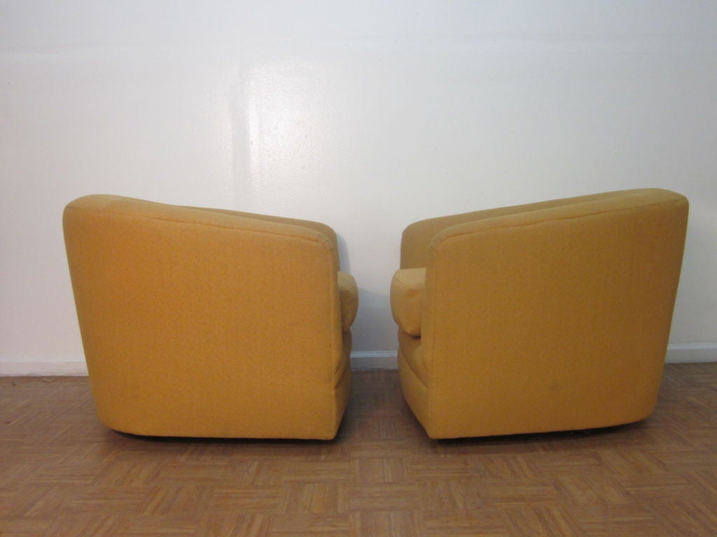 Upholstery Pair of Upholstered Barrel Back Swivel Chairs