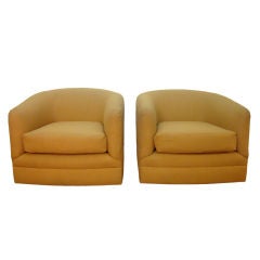 Pair of Upholstered Barrel Back Swivel Chairs