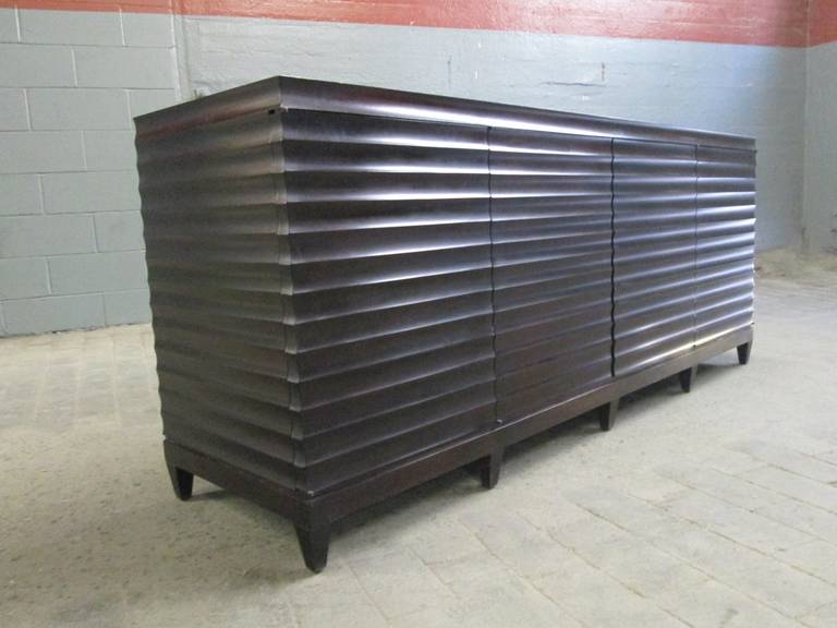 Barbara Barry credenza or dresser for Baker. Mahogany fluted front with shelves and drawer space.