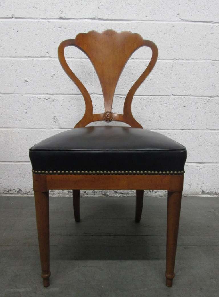 6 Biedermeier style chairs with a decorative back and black seats.  Great for dining.