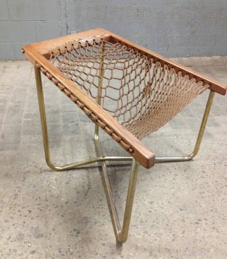 Mid-Century Modern rope chair. Chair has an oak frame and metal stretcher.