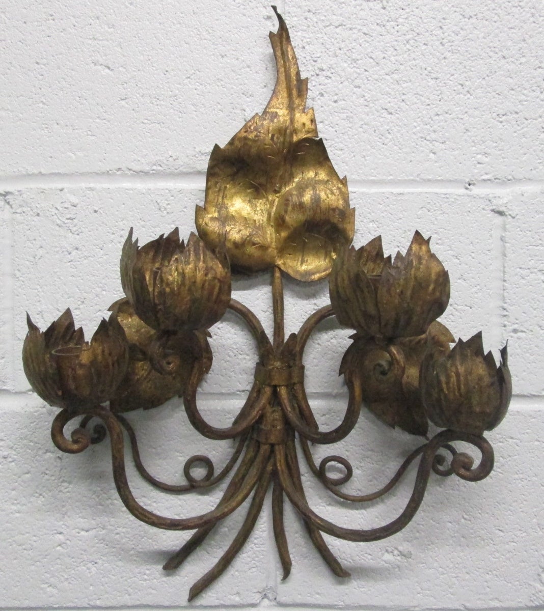 Pair of Italian oversized gilt floral sconces. Sconces are not electrified. 