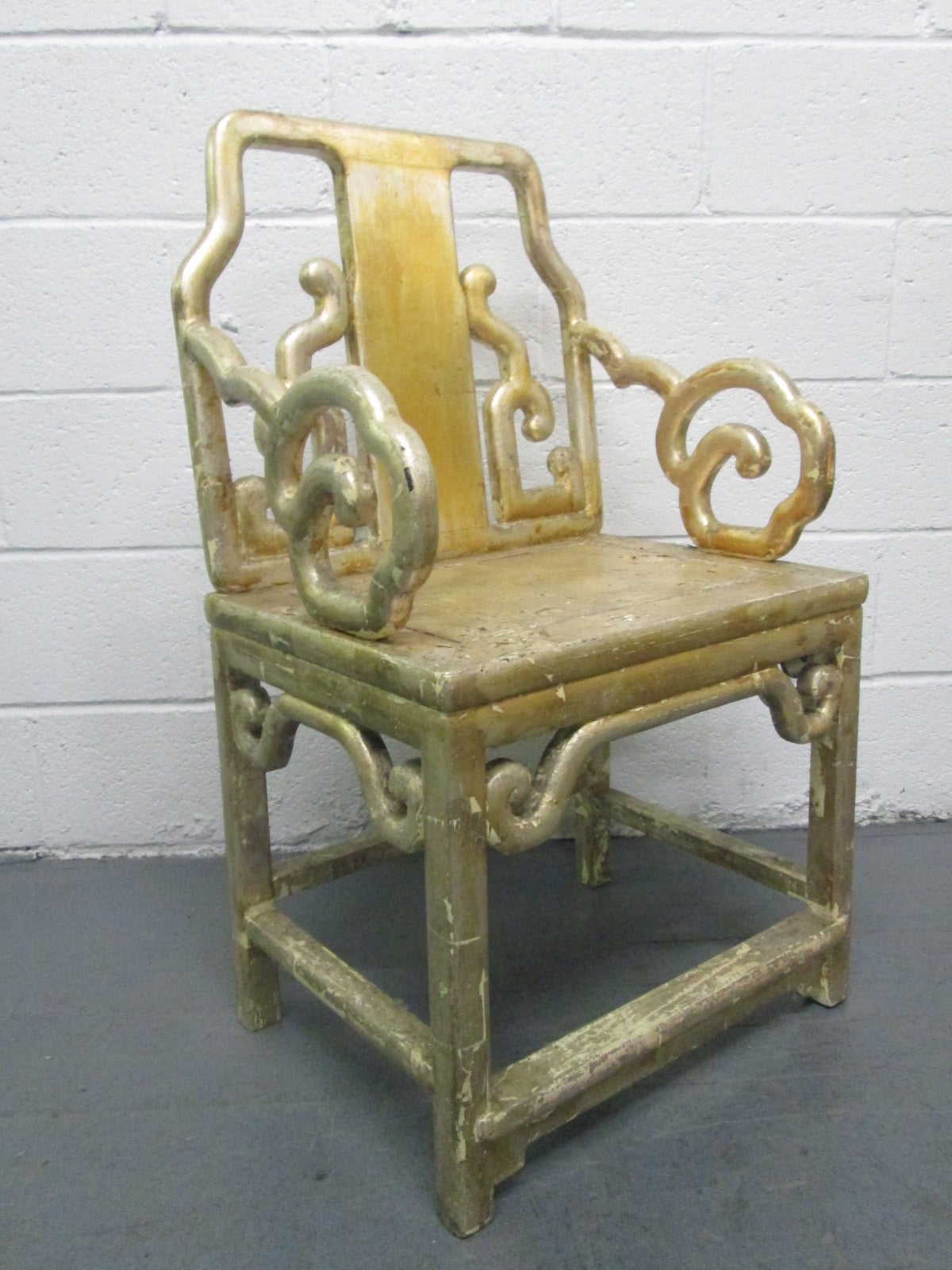 Set of four gilt hardwood Chinese armchairs. Very decorative with a nice look.