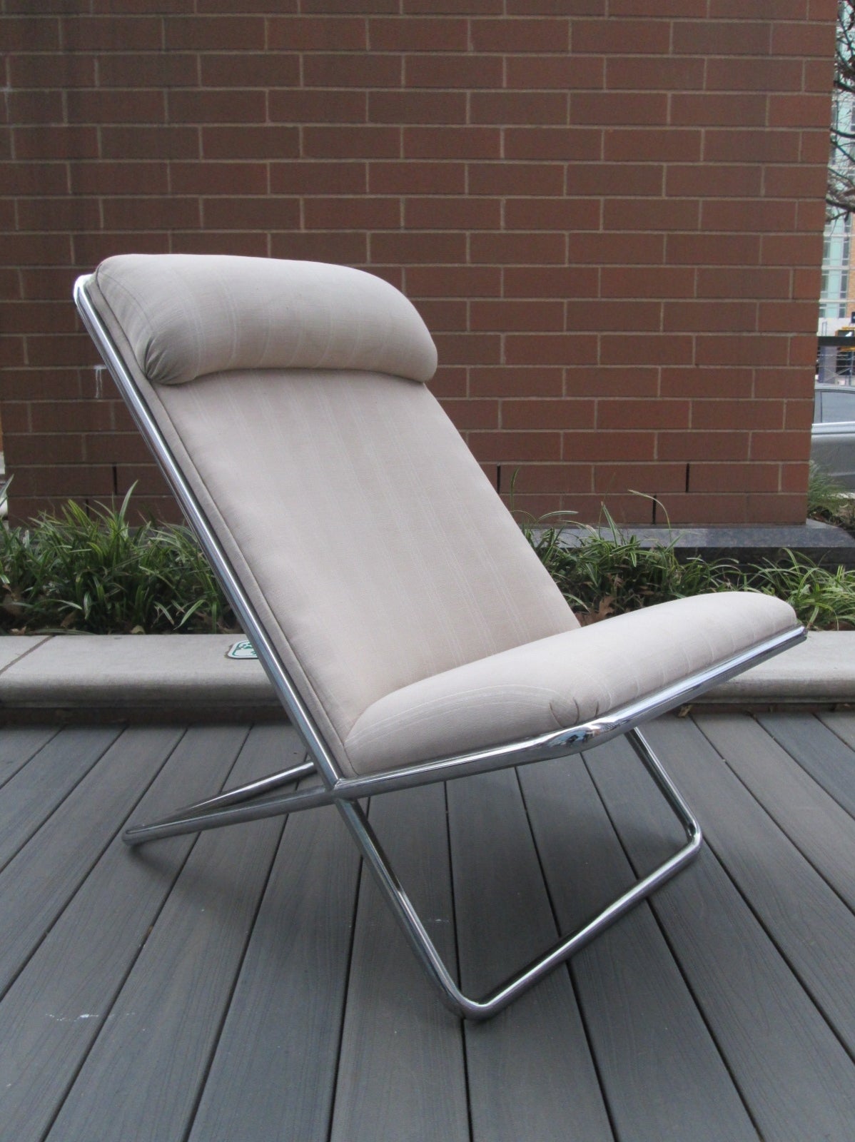 Ward Bennett Scissor Chair for Geiger.  Has a tubular polished steel frame.