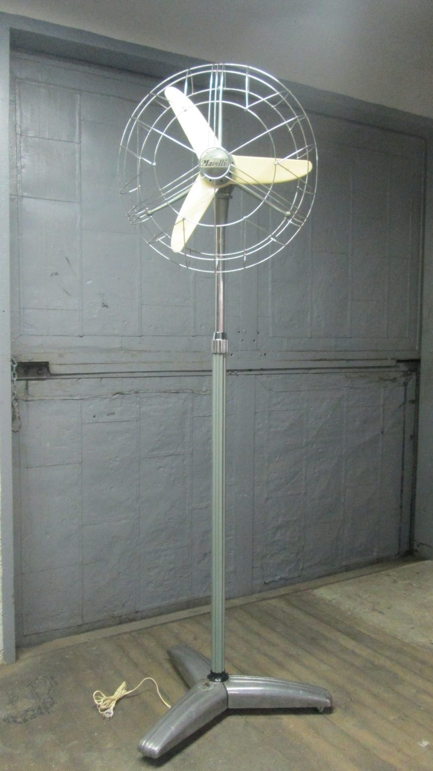 Rare Vintage Marelli Floor Fan.  Fan has wheels for easy moving and is height adjustable.  Made in Italy.