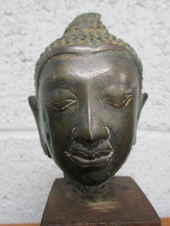 Chinese Export Bronze Buddha Head on Stand For Sale